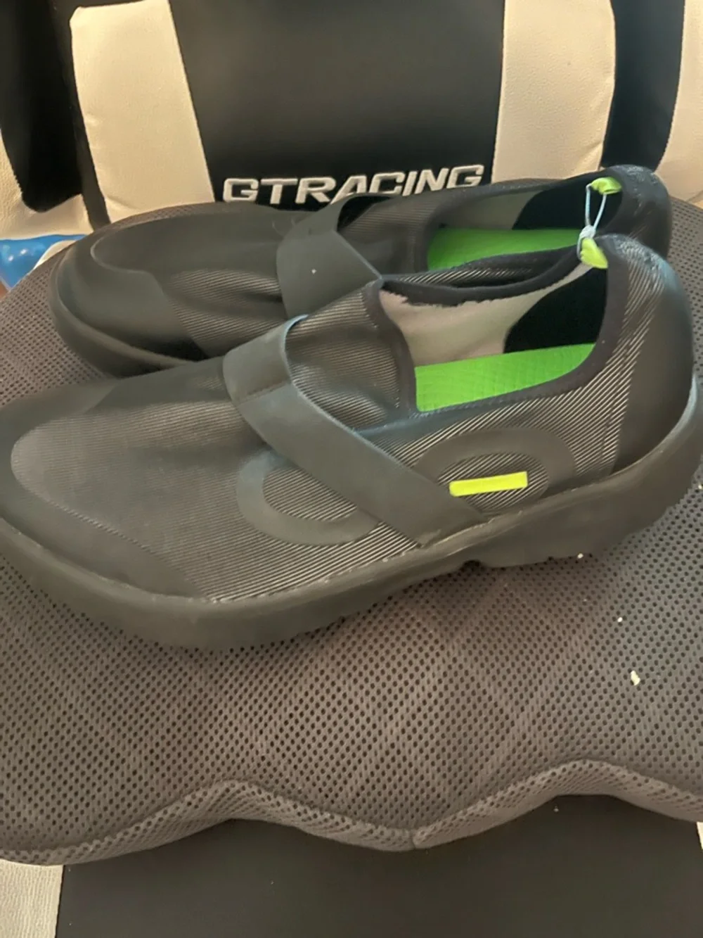 OOFOS Black Slip-On with Green Insole Accent
